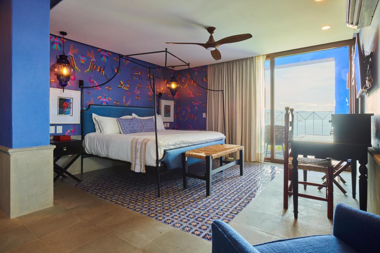 Hotel Luxury Patio Azul (Adults Only) Puerto Vallarta Bagian luar foto A bedroom at the hotel