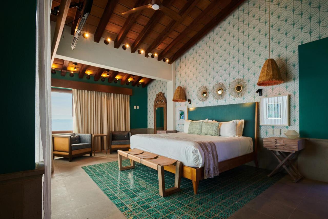 Hotel Luxury Patio Azul (Adults Only) Puerto Vallarta Bagian luar foto A bedroom at the hotel