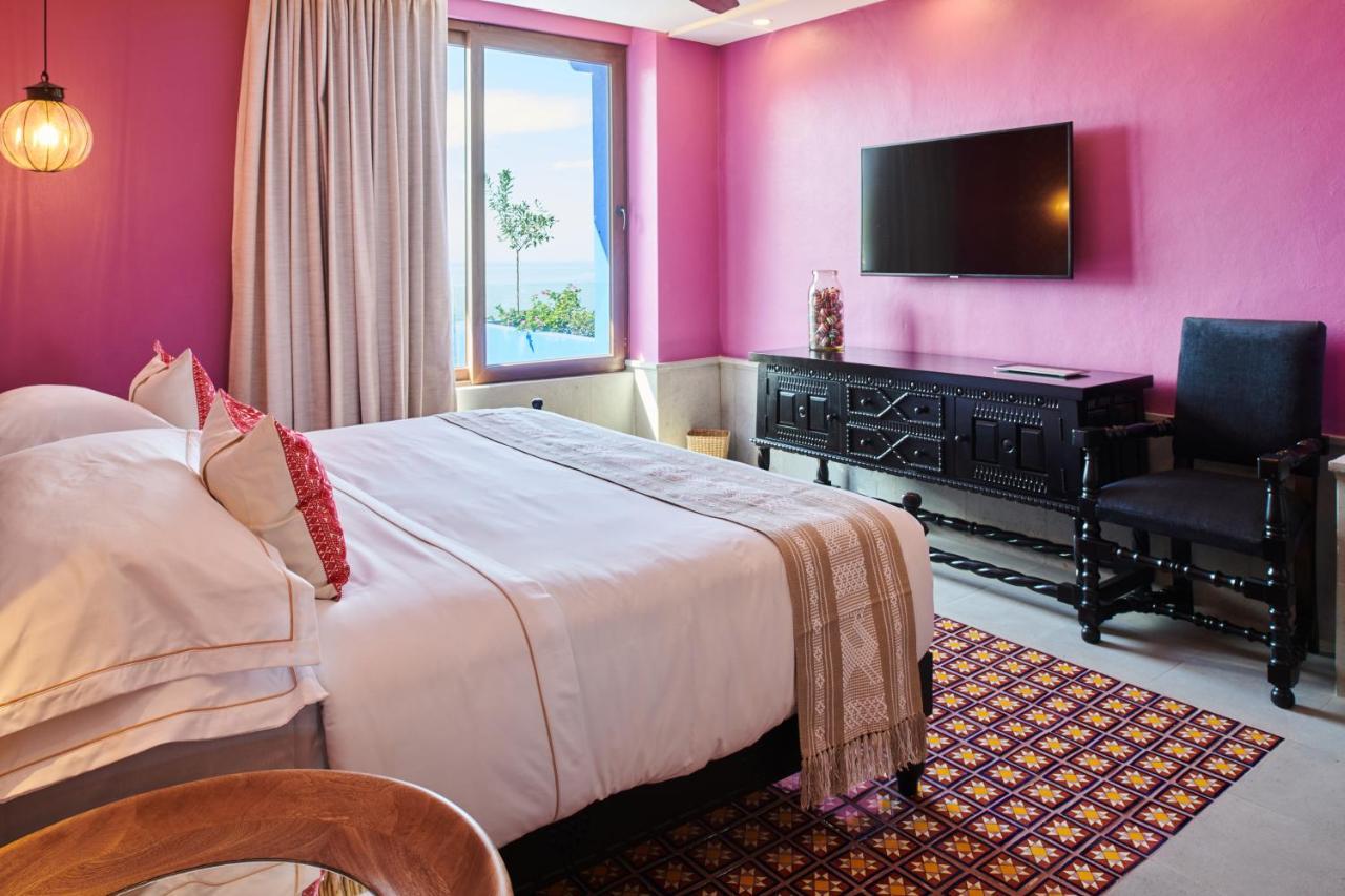 Hotel Luxury Patio Azul (Adults Only) Puerto Vallarta Bagian luar foto A bedroom at the hotel